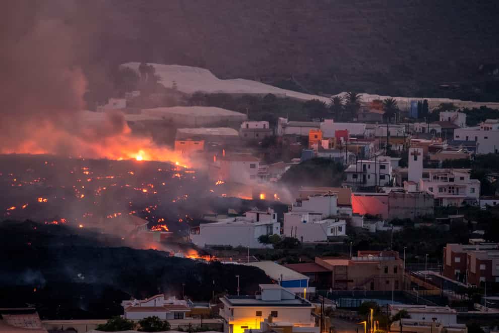Lava from the volcano has destroyed houses on La Palma (Saul Santos/AP)