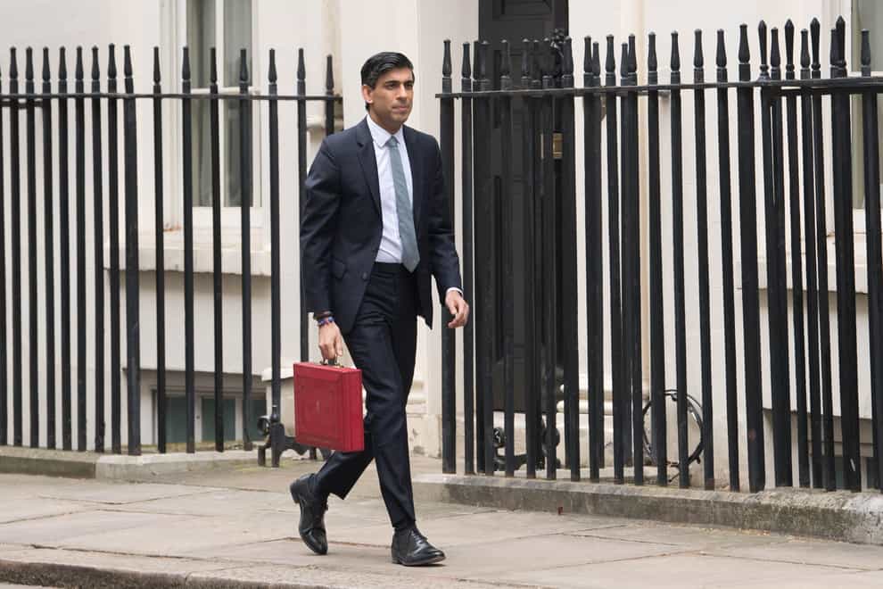 Chancellor of the Exchequer, Rishi Sunak outside 11 Downing Street, London, before heading to the House of Commons to deliver his Budget in March (Stefan Rousseau/PA)
