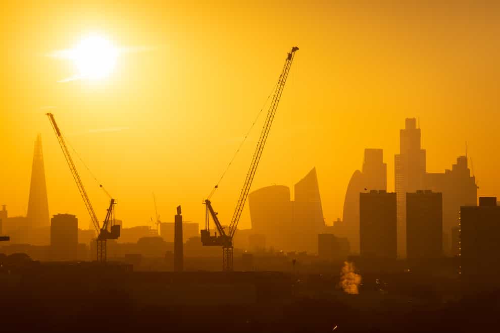 Sunset behind the London skyline (Dominic Lipinksi/PA)