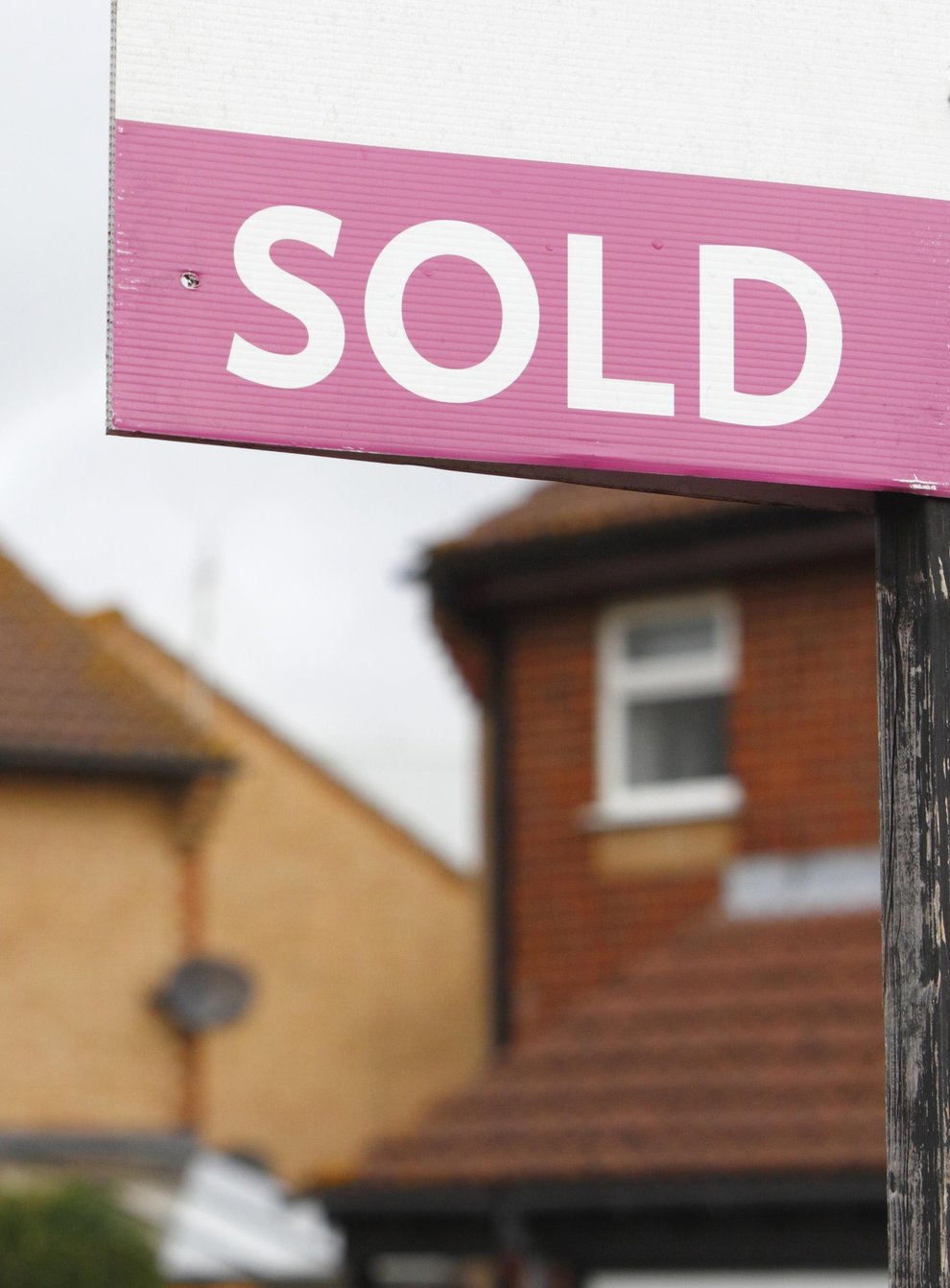 An estate agent’s sold sign outside a property (Chris Ison/PA)