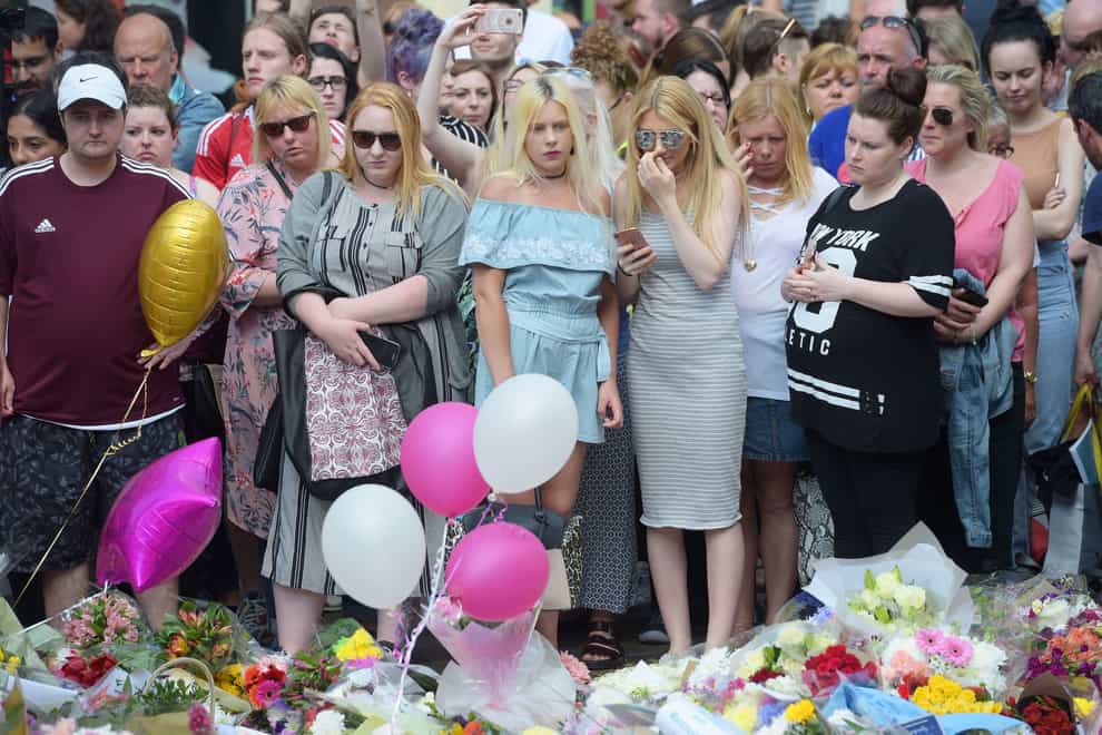 Floral tributes in St Ann’s Square, Manchester, to remember the victims of the terror attack at Manchester Arena in 2017 (Ben Birchall/PA)