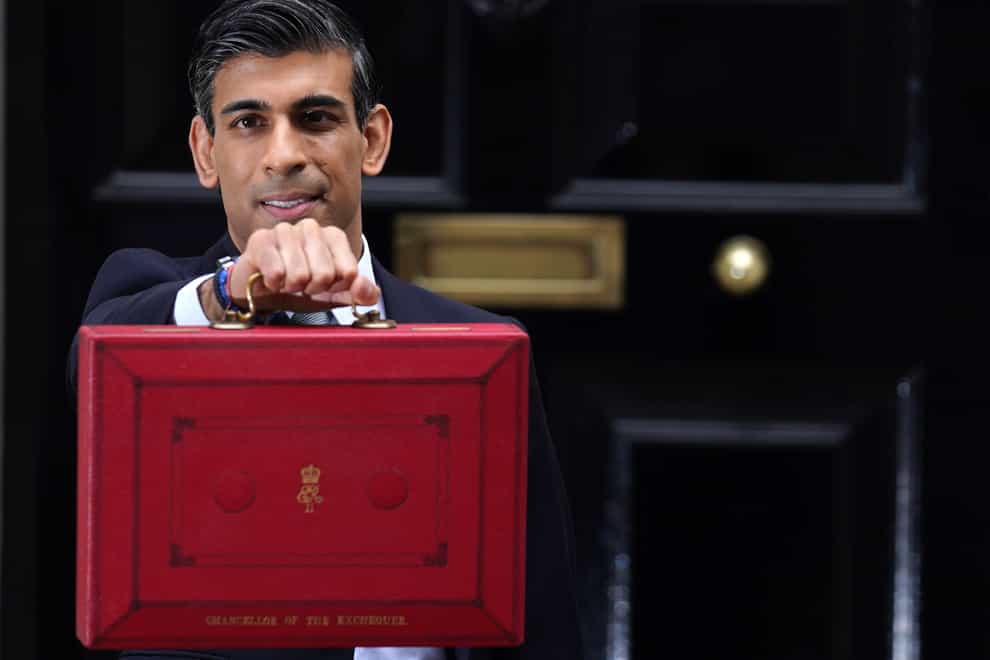 Chancellor Rishi Sunak leaving 11 Downing Street before delivering his Budget to the House of Commons (Jacob King/PA)