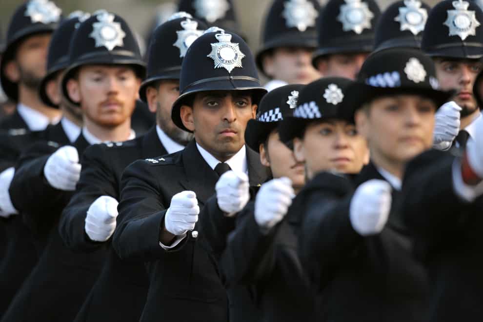 Metropolitan Police officers parade (PA)