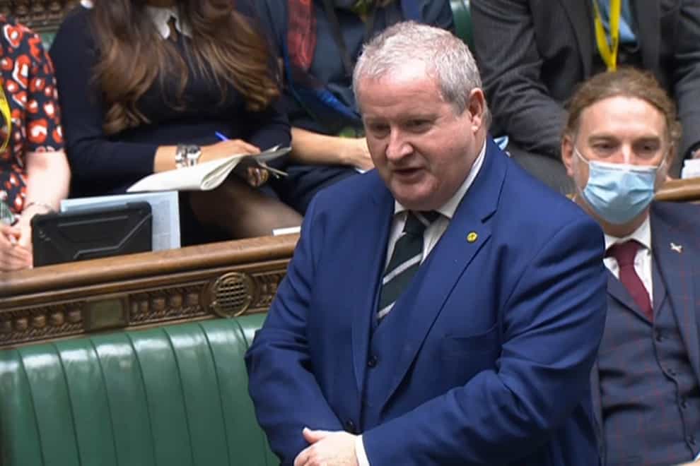 SNP Westminster leader Ian Blackford urged the Chancellor to drop his plans for cutting APD on domestic flights (PA)