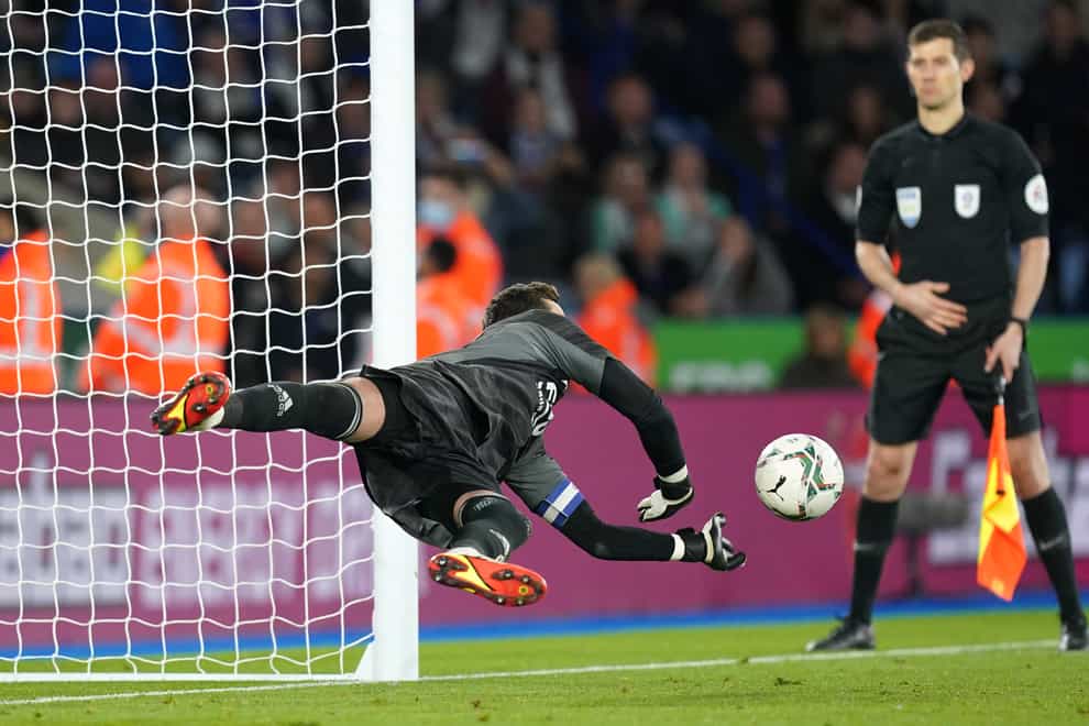Leicester goalkeeper Danny Ward saves the decisive penalty (David Davies/PA)