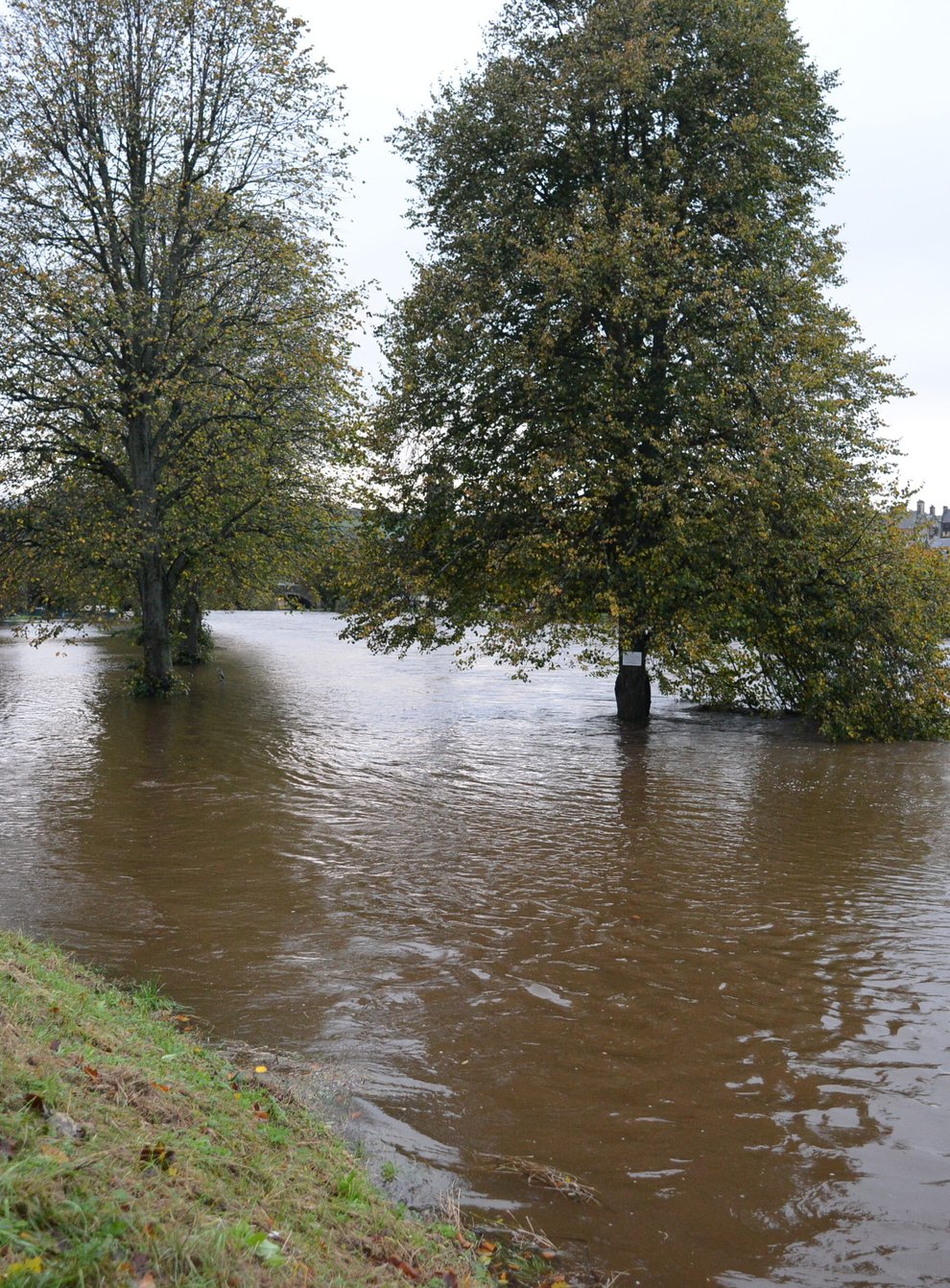Flooding in Peebles in the Scottish Borders where the River Tweed has burst its banks (Mark Davey/PA)