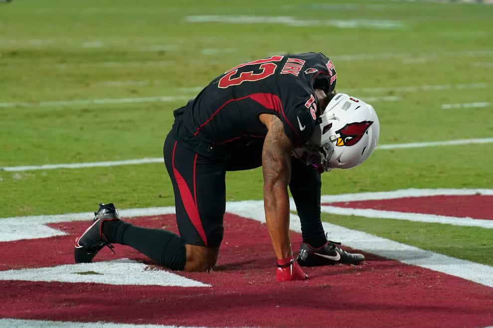 Arizona Cardinals wide receiver Christian Kirk kneels in the end zone after a turnover (Rick Scuteri/AP)
