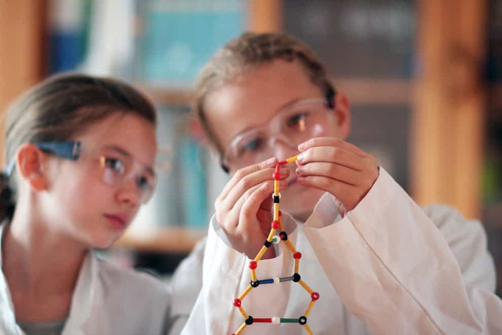 A Generic Photo of two children building a model of DNA (Alamy/PA)