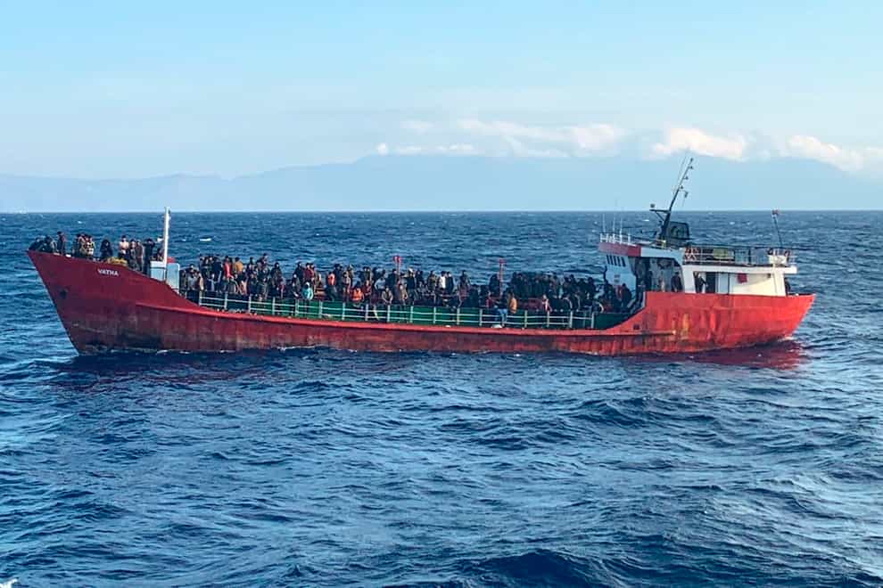 A ship with migrants on board near the southern island of Crete (Hellenic Coast Guard via AP)