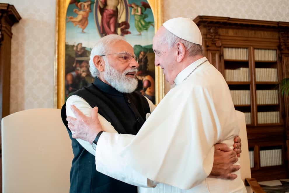 India’s Narendra Modi hugs Pope Francis (Vatican Media via AP)