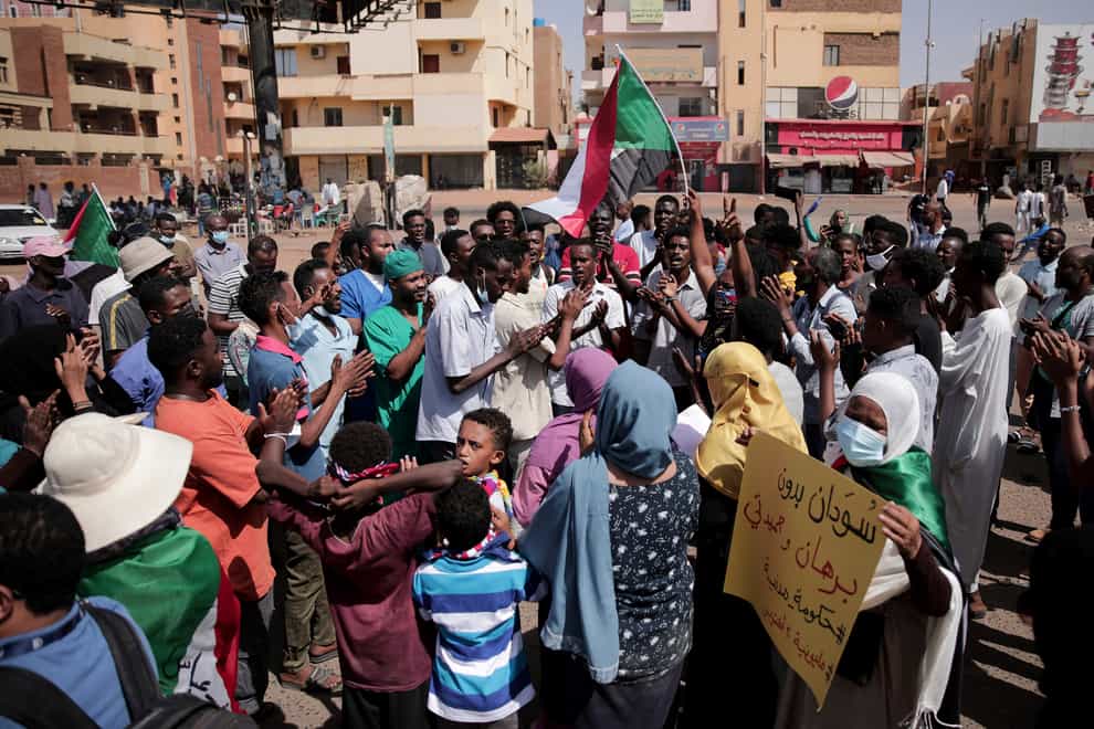 People chant slogans during a protest in Khartoum, Sudan (Marwan Ali/AP)