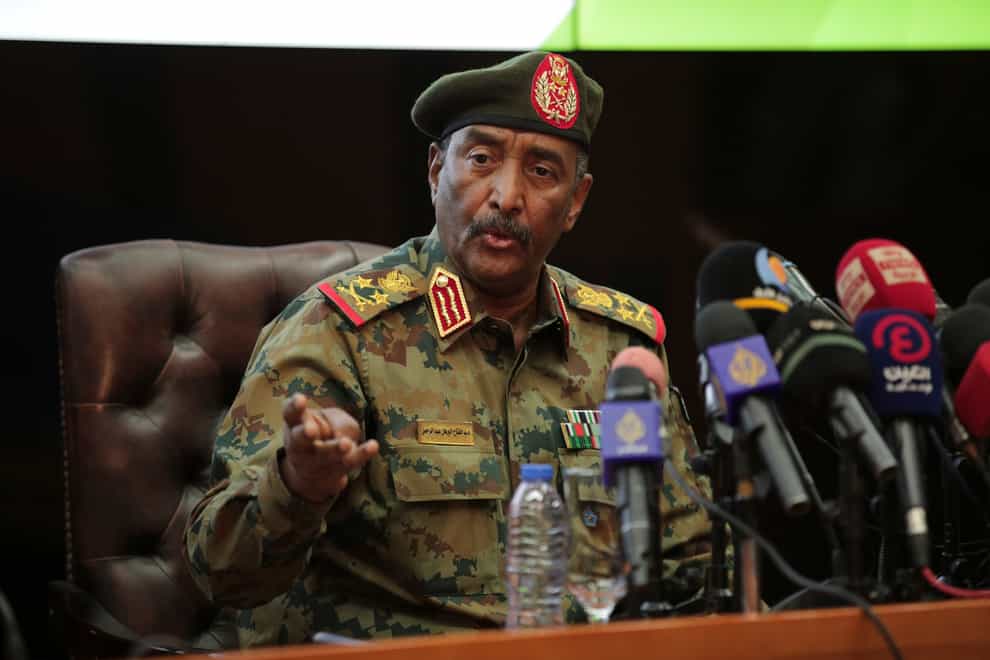 Sudan’s head of the military, Gen. Abdel-Fattah Burhan,peaks during a press conference at the General Command of the Armed Forces in Khartoum, Sudan, Tuesday, Oct. 26, 2021. Burhan said that some members of the government he dissolved in a coup could face trial but said that the deposed prime minister was being held for his own safety and would likely be released soon. (AP Photo/Marwan Ali)
