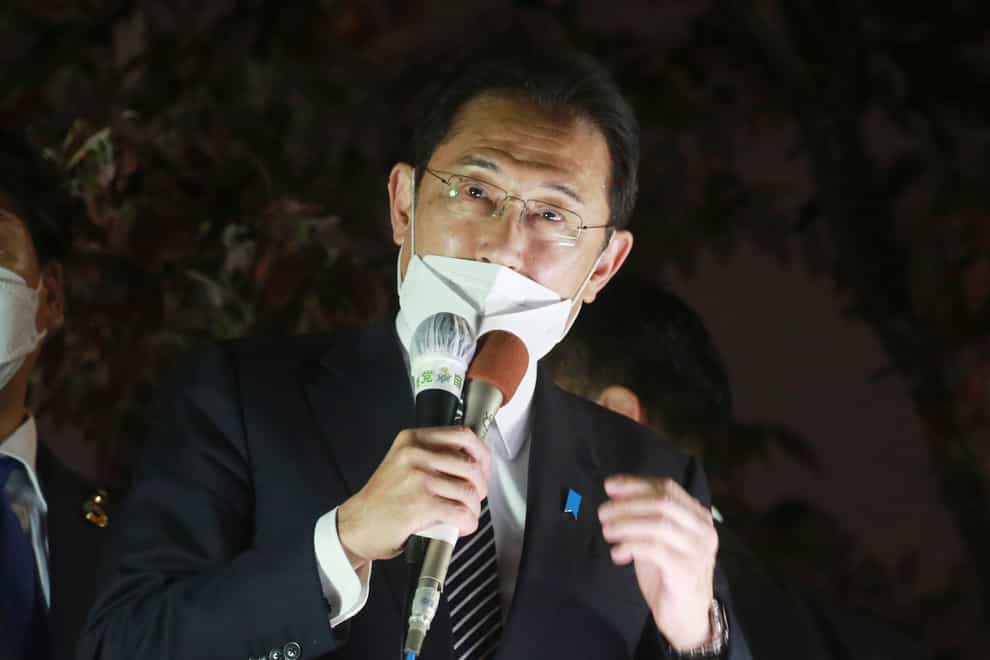 Japanese Prime Minister and President of the governing Liberal Democratic Party Fumio Kishida delivers a speech during an election campaign for the Oct. 31 lower house elections, in Tokyo, Tuesday, Oct. 26, 2021. Kishida faces a crucial test in Sunday’s national parliamentary elections, which will determine if his government will have enough support to stay in power long enough to repair the pandemic-hit economy, and tackle climate change and China’s rise. (AP Photo/Koji Sasahara)
