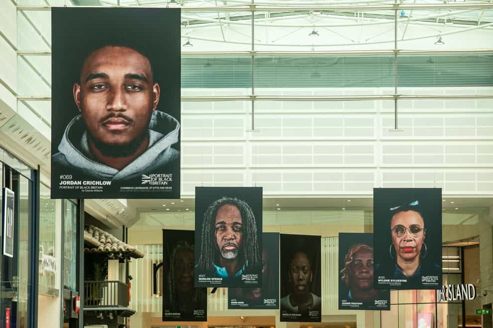 Portrait of Black Britain, seen here in Manchester Arndale, aims to become the largest collection of portraits of black Britons (Jason Lock/Portrait of Black Britain/PA)