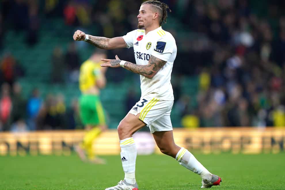 Kalvin Phillips celebrates in front of the Leeds fans after the final whistle at Norwich (Joe Giddens/PA)