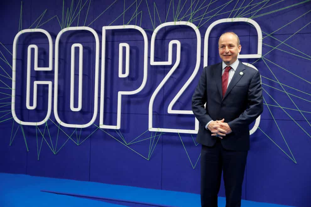 Taoiseach Micheal Martin arrives for the Cop26 summit at the Scottish Event Campus (SEC) in Glasgow (Phil Noble/PA)