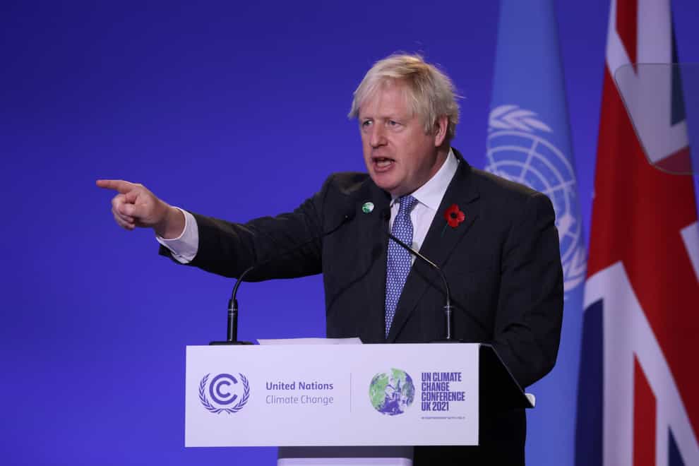 Prime Minister Boris Johnson told the Cop26 summit that words alone are not enough (Yves Herman/PA)