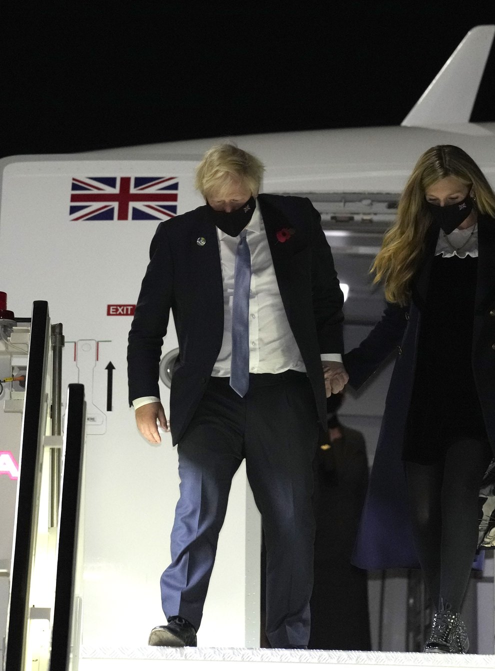 Boris Johnson and his wife Carrie disembark in Rome from a private charter flight (Kirsty Wigglesworth/PA)