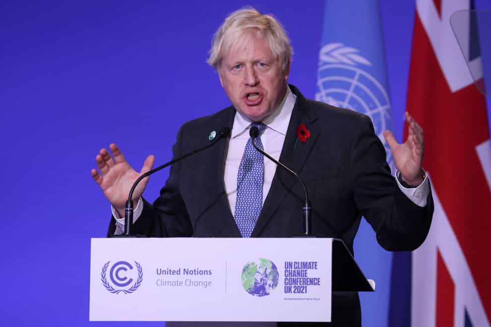 Boris Johnson said leaders at Cop26 needed to get real about climate change (Yves Herman/PA)