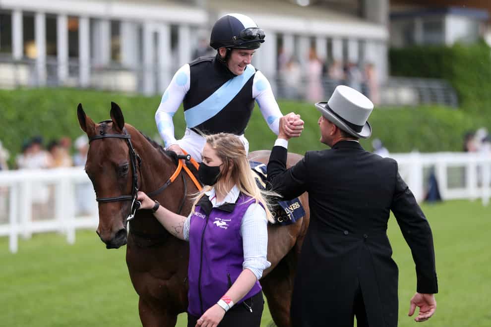 Gary Carroll celebrates on board Quick Suzy with trainer Gavin Cromwell after winning the Queen Mary Stakes at Royal Ascot (David Davies/PA)