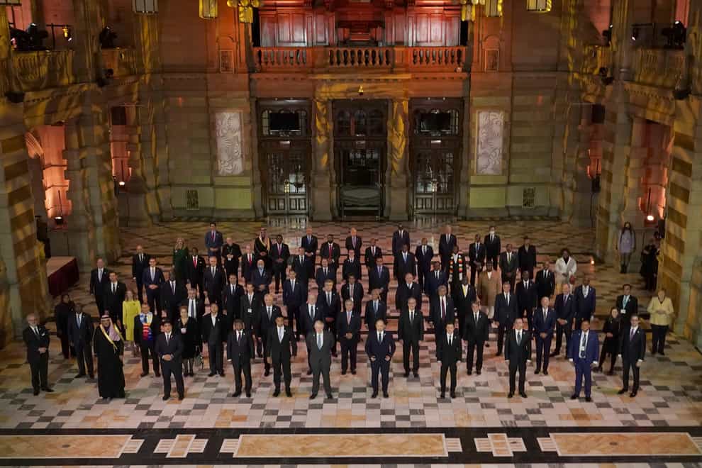 World Leaders pose for a group photo during an evening reception for the attending Heads of State and Government, to mark the opening day of the Cop26 summit in Glasgow. Picture date: Monday November 1, 2021.