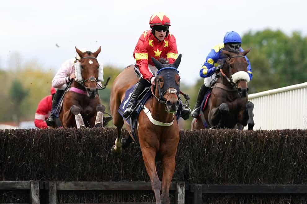 Brian Hughes and Minella Drama (centre) winning the Kalahari King Novices’ Limited Handicap Chase at Uttoxeter (Tim Goode/PA)