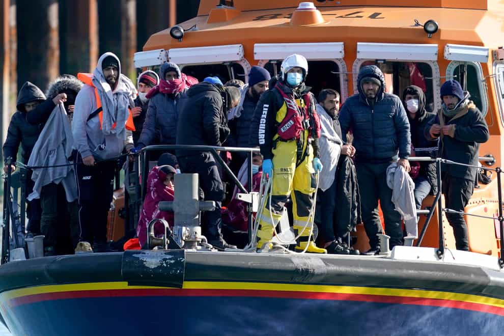 A group of people thought to be migrants are brought in to Dover, Kent, onboard the Dover Lifeboat following a small boat incident in the Channel. (Gareth Fuller/PA) Picture date: Tuesday November 2, 2021.