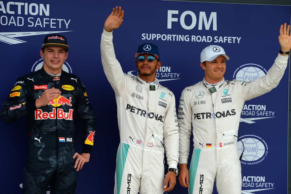 Lewis Hamilton, centre, alongside Nico Rosberg, right, and Max Verstappen, left, in 2016 (Tony Marshall/PA)