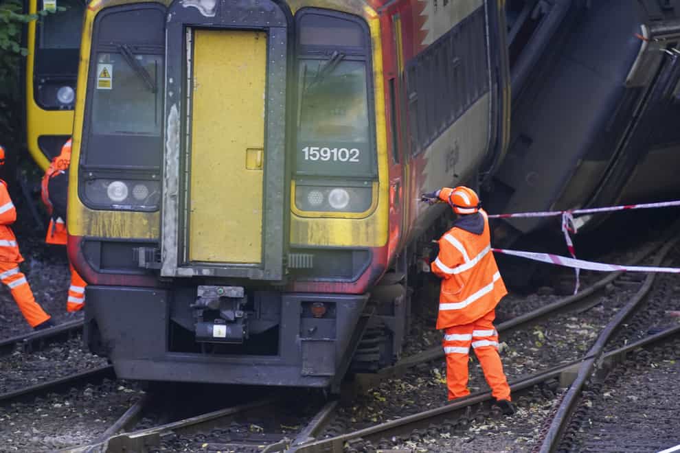 A train involved in a crash in Salisbury failed to stop at a red signal as its wheels slipped on the rails, investigators believe (Steve Parsons/PA)