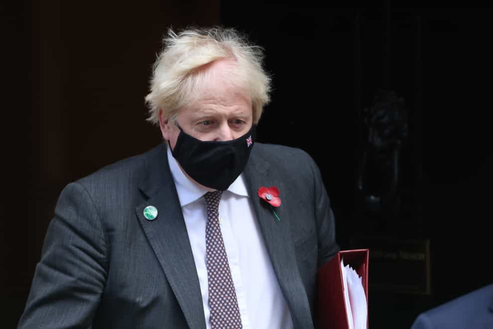 Prime Minister Boris Johnson leaves 10 Downing Street, London, to attend Prime Minister’s Questions (James Manning/PA)