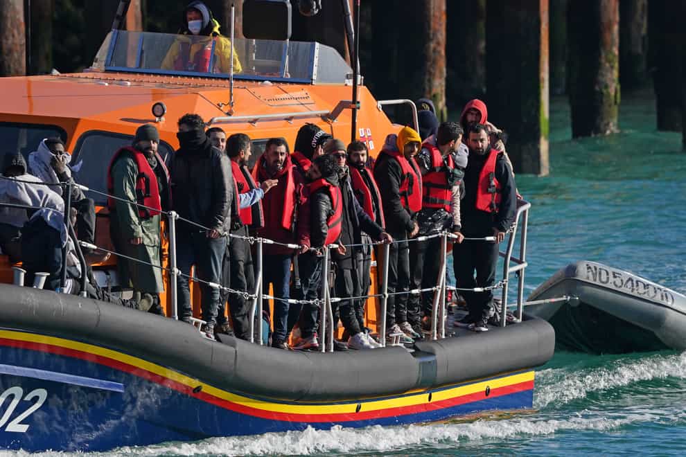 A group of people thought to be migrants are brought in to Dover, Kent, onboard the Dungeness Lifeboat following a small boat incident in the Channel. (Gareth Fuller/PA) Picture date: Wednesday November 3, 2021.