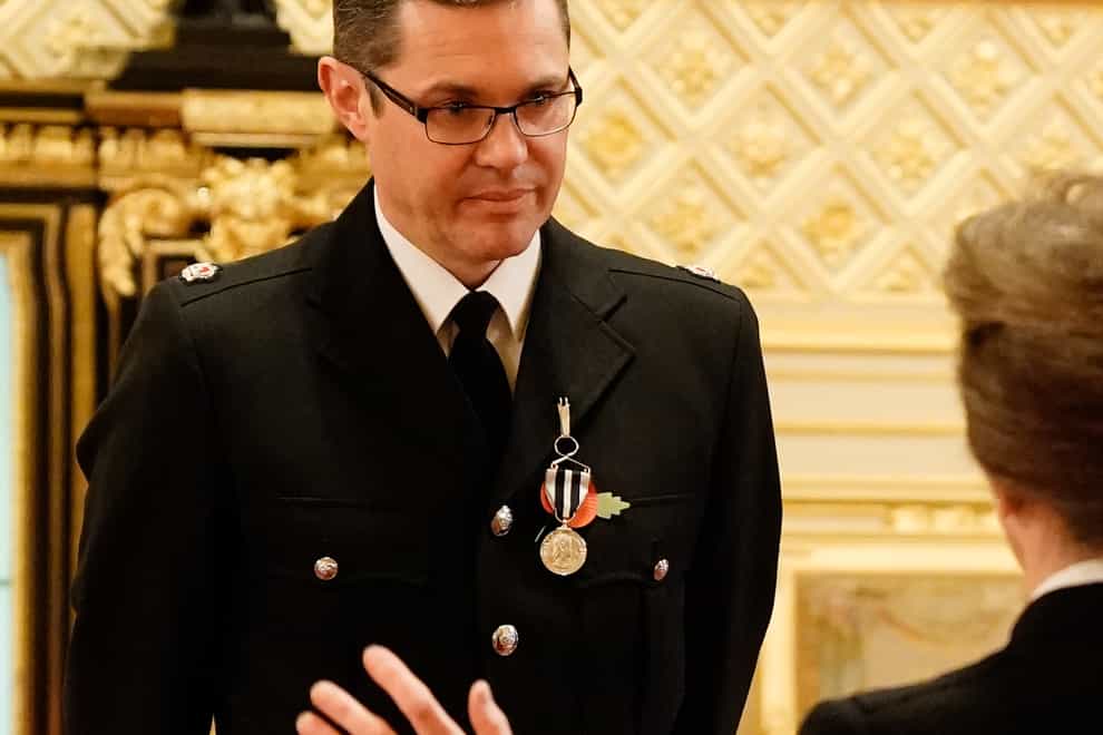Superintendent David Minty is decorated with the Queen’s Police Medal (Aaron Chown/PA)