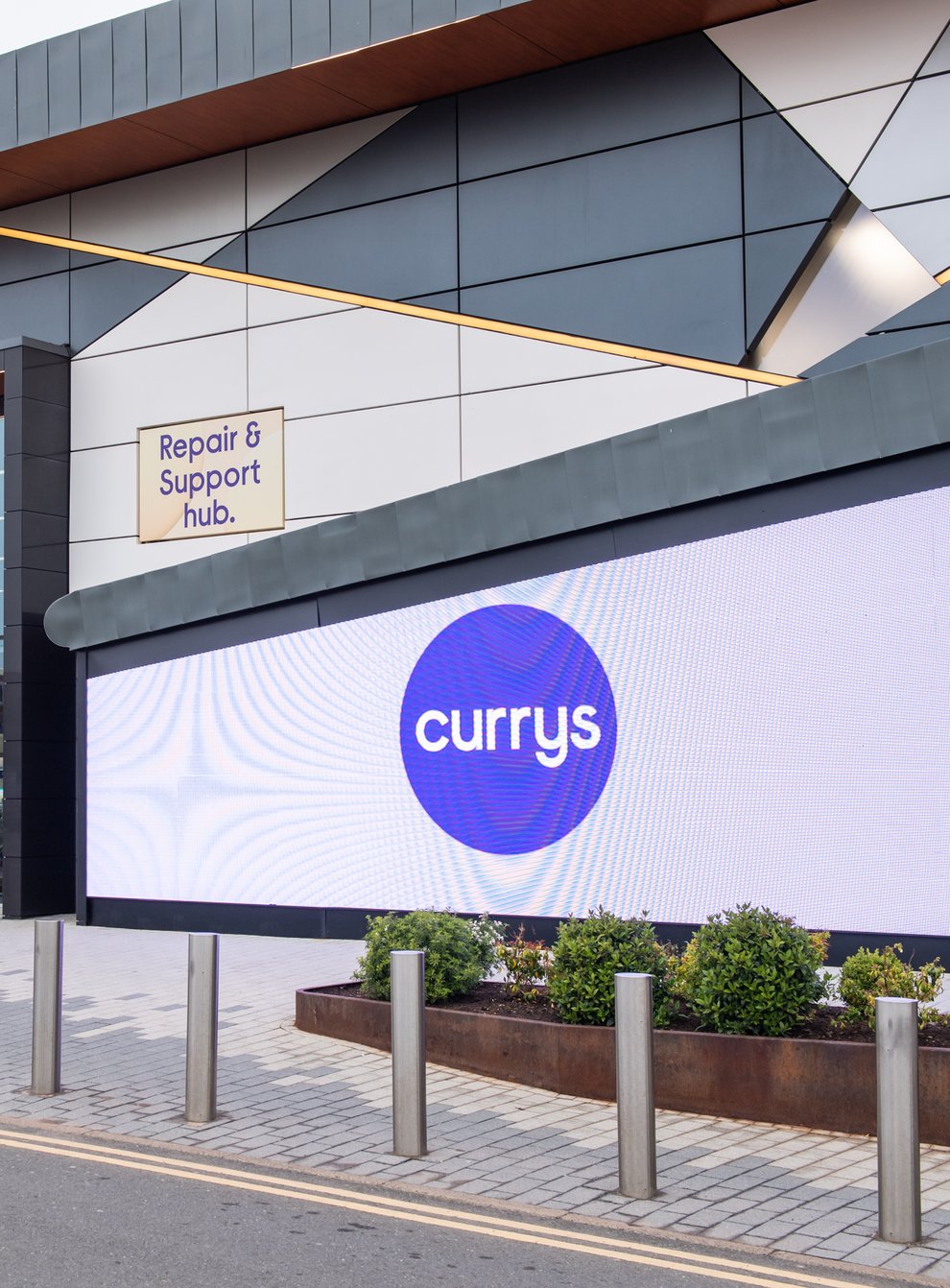 Currys will hand back £75m to shareholders in a share buyback programme (Currys/PA)