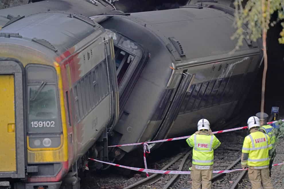 The first damaged carriages will be removed from the scene of the Salisbury train crash on Thursday (Steve Parsons/PA)
