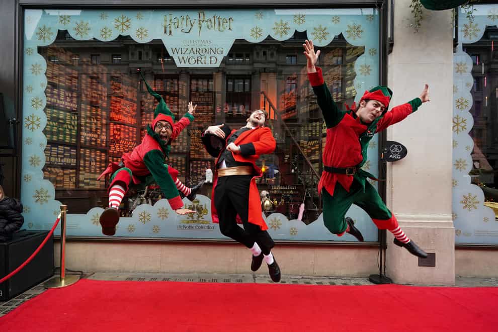 Elves perform during the unveiling of Hamleys’ Christmas windows (Kirsty O’Connor/PA)