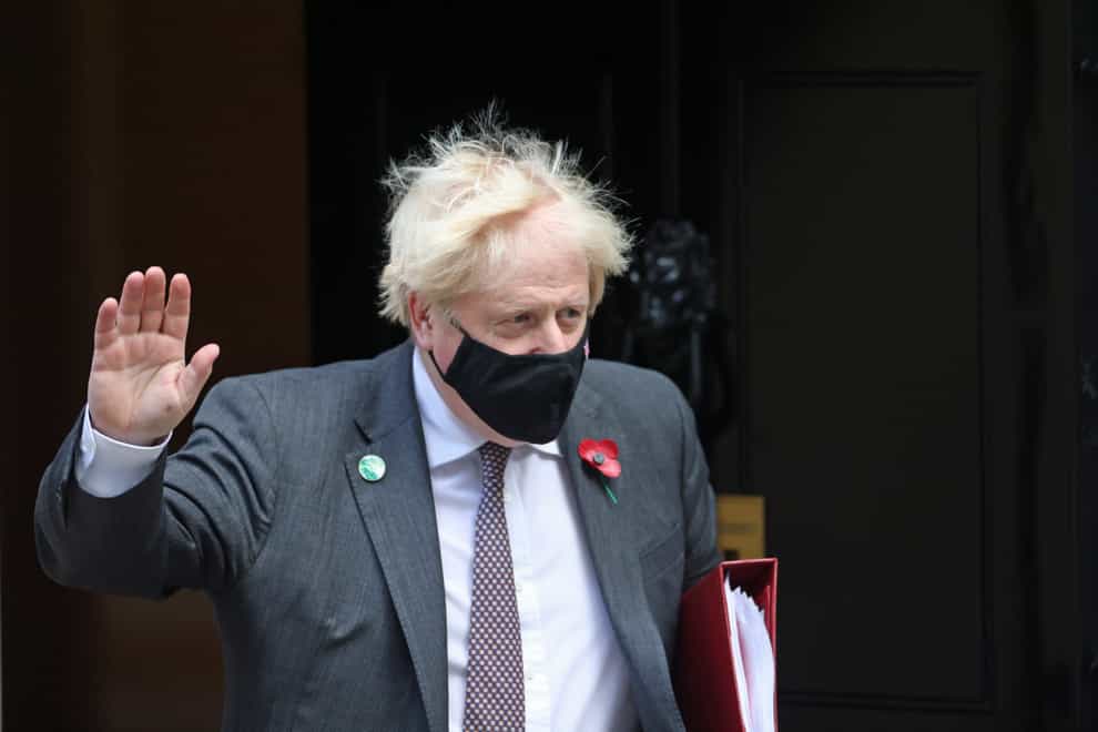 Prime Minister Boris Johnson waves as he leaves 10 Downing Street (James Manning/PA)