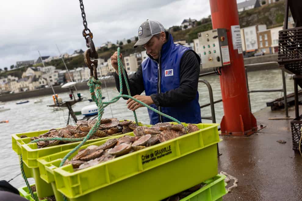 French fisherman Herman Outrequin, who does not have a licence to fish in UK waters, works in the port of Granville, Normandy (Jeremias Gonzalez/AP)