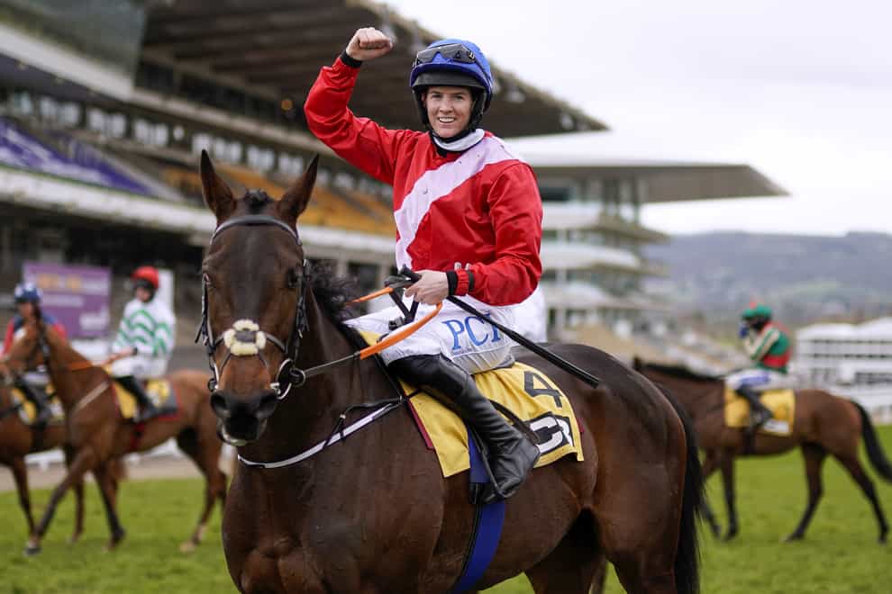 Rachael Blackmore celebrates after winning the Triumph Hurdle on Quilixios (Alan Crowhurst/PA)