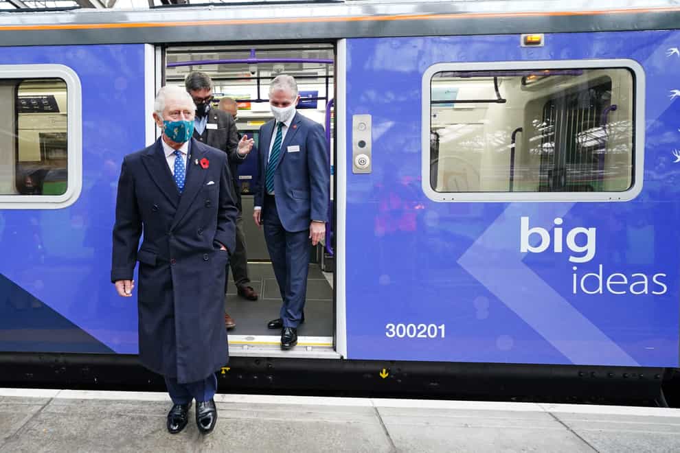 The Prince of Wales during a visit to Glasgow Central Station to view two alternative fuel green trains (Jane Barlow/PA)