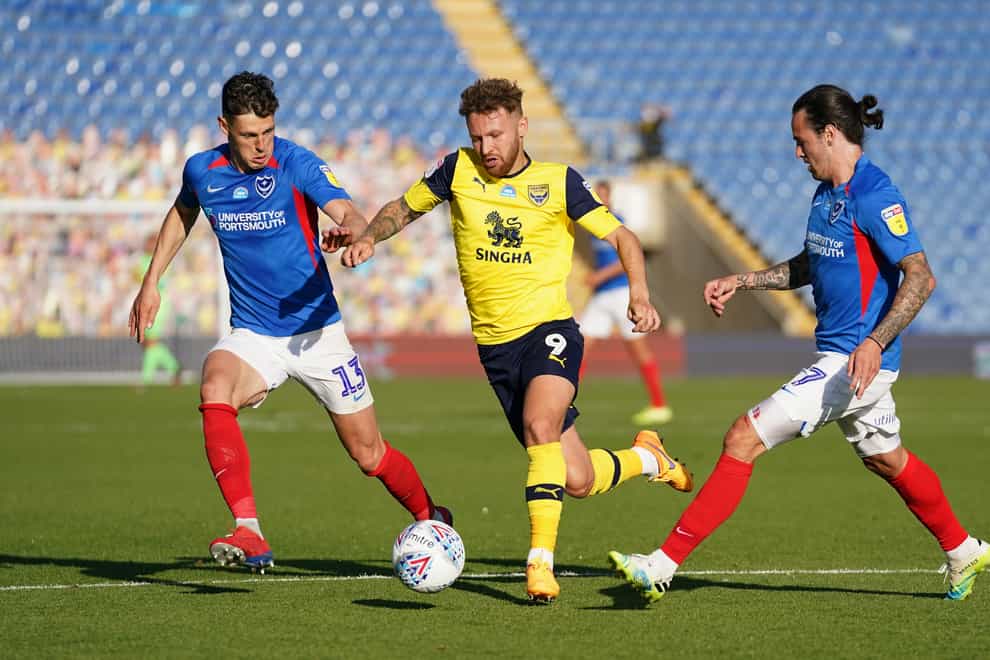 Matty Taylor, centre, will come up against old club Bristol Rovers in the FA Cup this weekend (John Walton/PA)