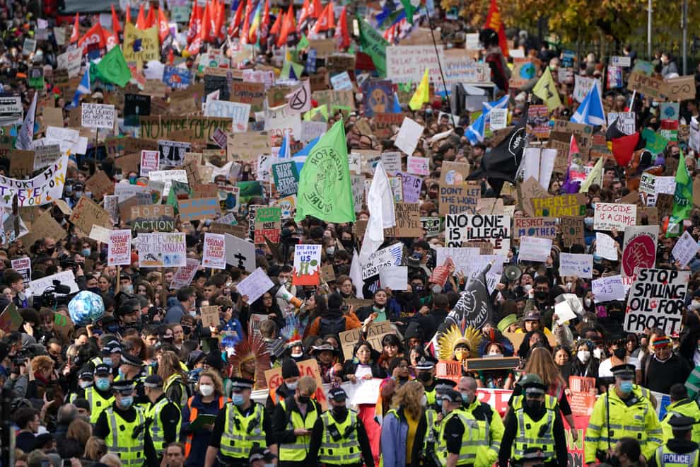 Demonstrators during the Fridays for Future Scotland march through Glasgow during the Cop26 summit on Friday (Andrew Milligan/PA)