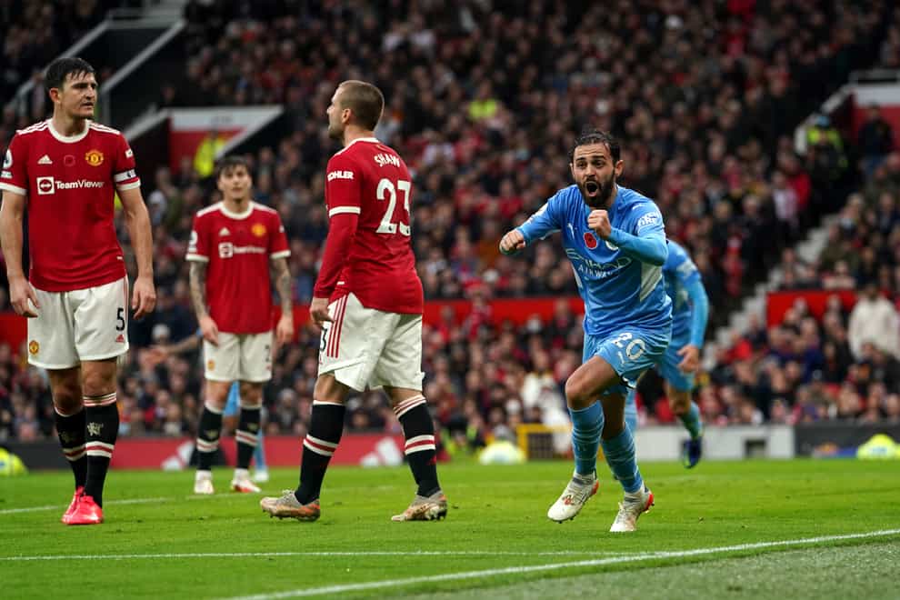 Manchester City’s Bernardo Silva puts his team two goals up against Manchester United (Martin Rickett/PA).