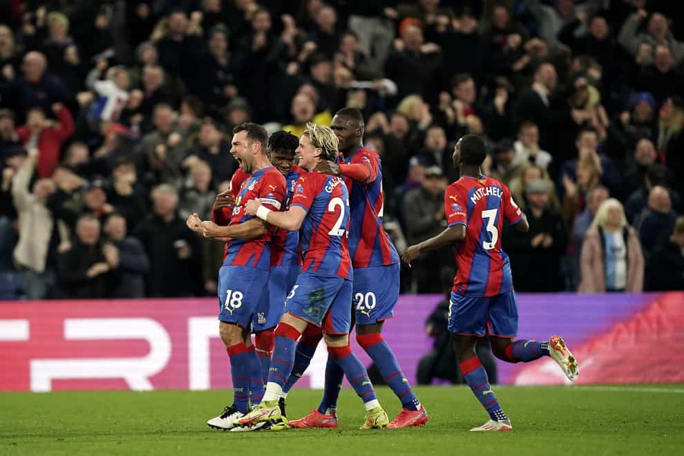 Crystal Palace celebrate Wilfried Zaha’s opening goal against Wolves (Aaron Chown/PA)