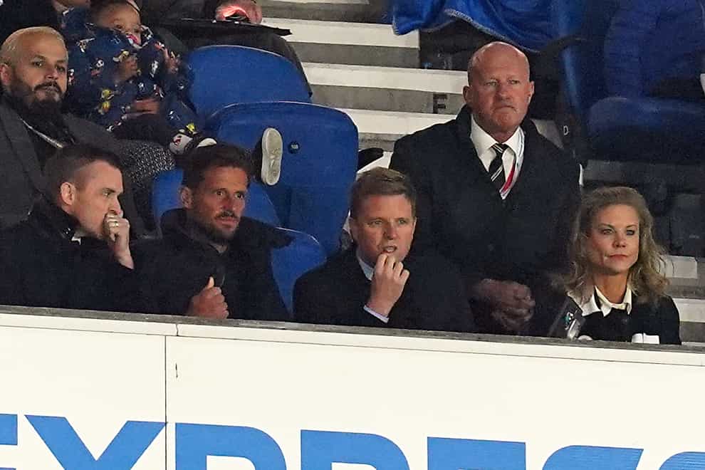 Eddie Howe (centre), Newcastle owner Amanda Staveley (right) and former Bournemouth assistant manager Jason Tindall watched Newcastle at Brighton (Gareth Fuller/PA)