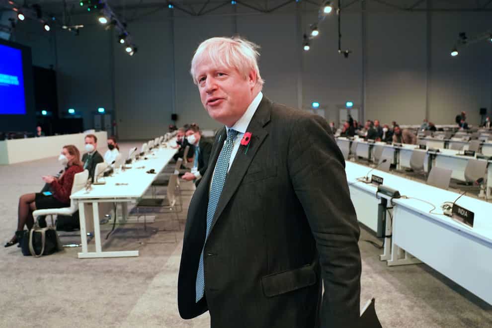 Prime Minister Boris Johnson arrives for an event during the Cop26 summit at the Scottish Event Campus (SEC) in Glasgow. Picture date: Tuesday November 2, 2021.