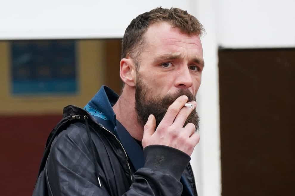 Football fan Jamie Arnold, 31, outside Walsall Magistrates’ Court, Staffordshire, where he is on trial accused of using threatening or abusive words or behaviour during a Premier League match. Arnold pleaded not guilty at a previous hearing to behaving in a manner “likely to cause harassment, alarm or distress” during the match between Wolves and Manchester United on May 23. Picture date: Monday November 8, 2021.