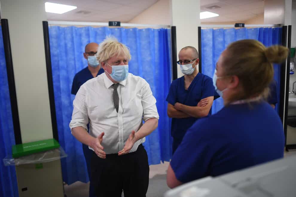Boris Johnson meets staff during a visit to Hexham General Hospital (Peter Summers/PA)
