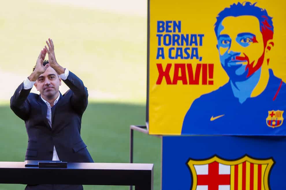 Xavi Hernandez was unveiled as Barcelona coach on Monday (Joan Monfort/AP)