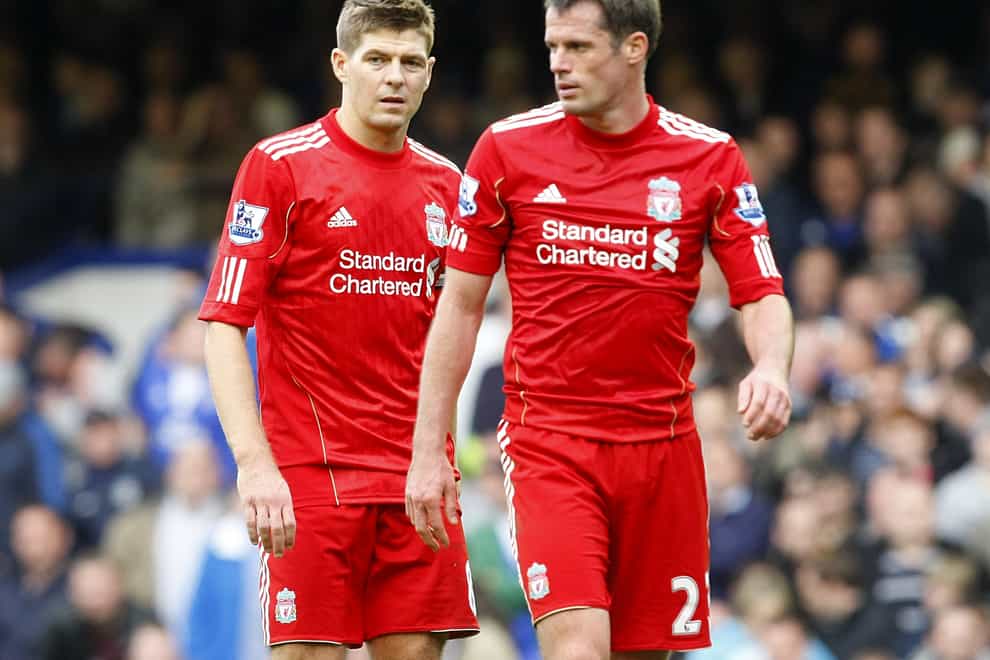 Steven Gerrard (left) and Jamie Carragher (right) are former team-mates at Liverpool (Peter Byrne/PA)