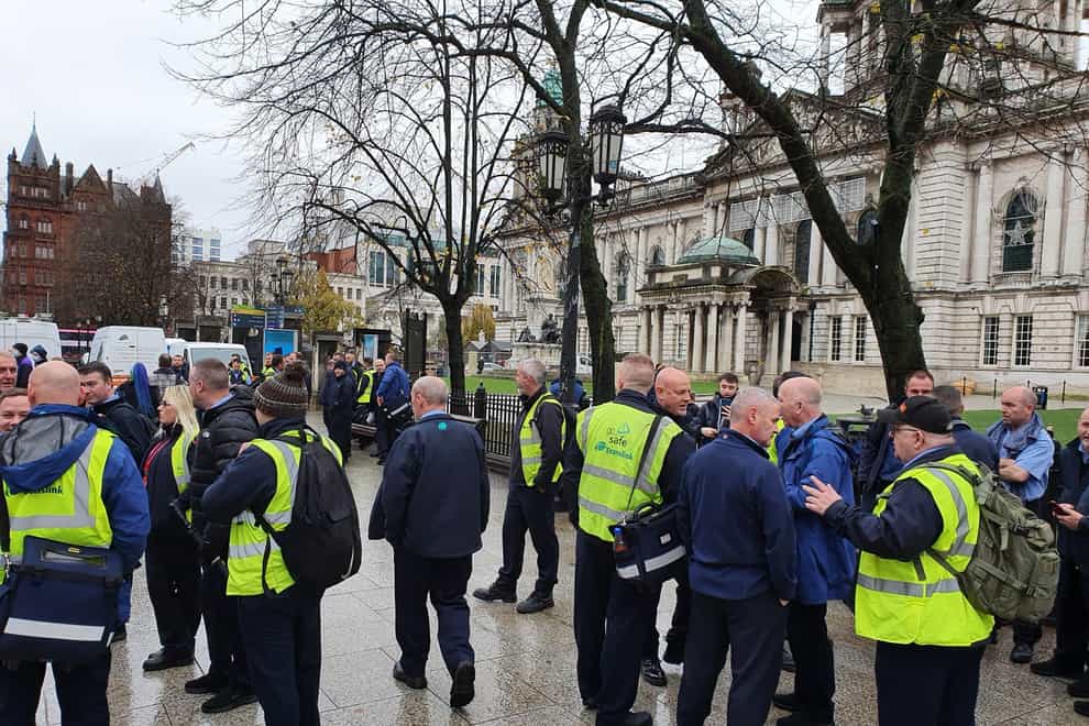 Bus drivers in Belfast staged a walk-out in solidarity towards colleagues after a bus was hijacked and burnt out in Newtownabbey (Unite the Union/PA)